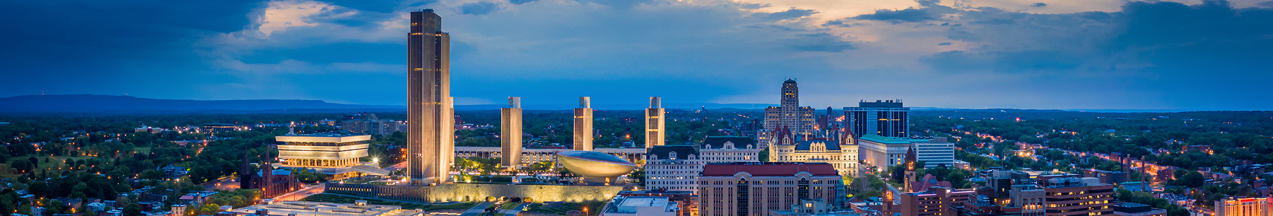 Albany New York State at sunset. View of the Capitol building and surrounding buildings from a birds eye view.